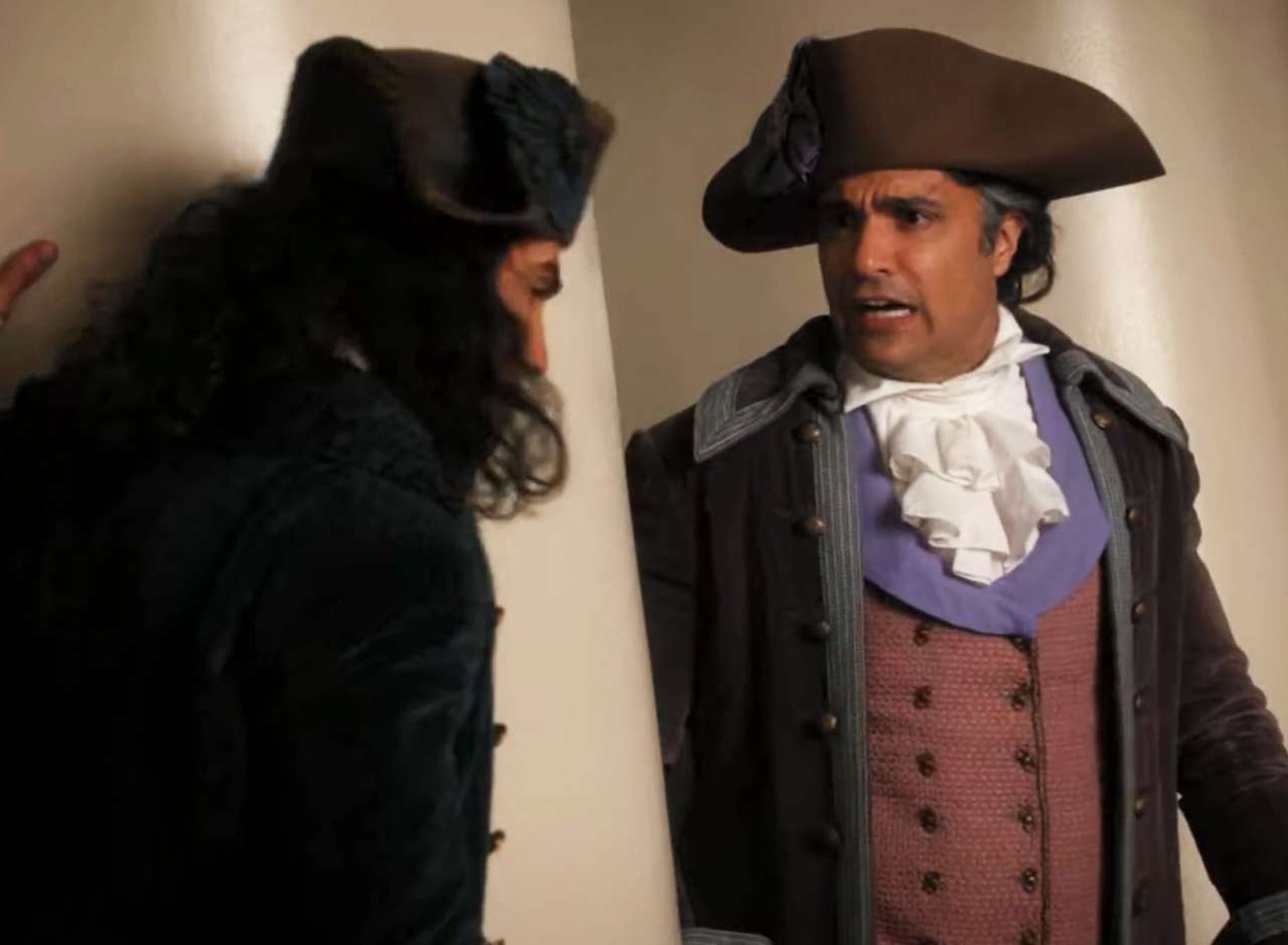 Guillermo looks concerned while talking to Hector